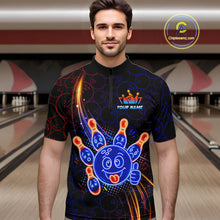 Load image into Gallery viewer, Man standing in a bowling alley wearing a black neon-style bowling quarter zip shirt with a glowing blue cartoon bowling ball mascot, fiery orange pin graphics, and custom name text.