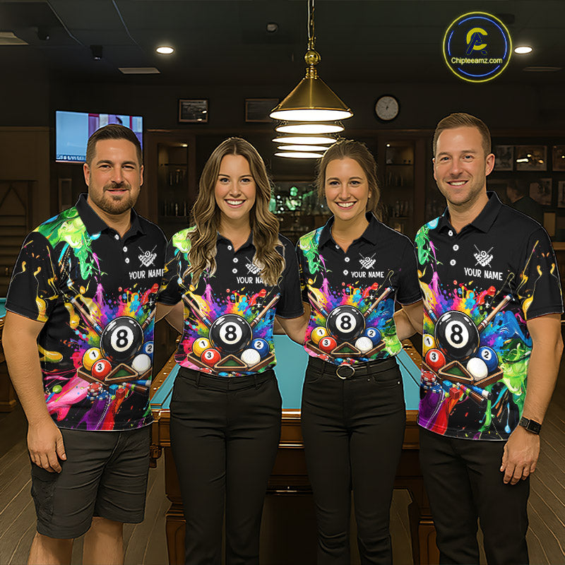 Four people wearing colorful billiard team shirts in a billiard alley.