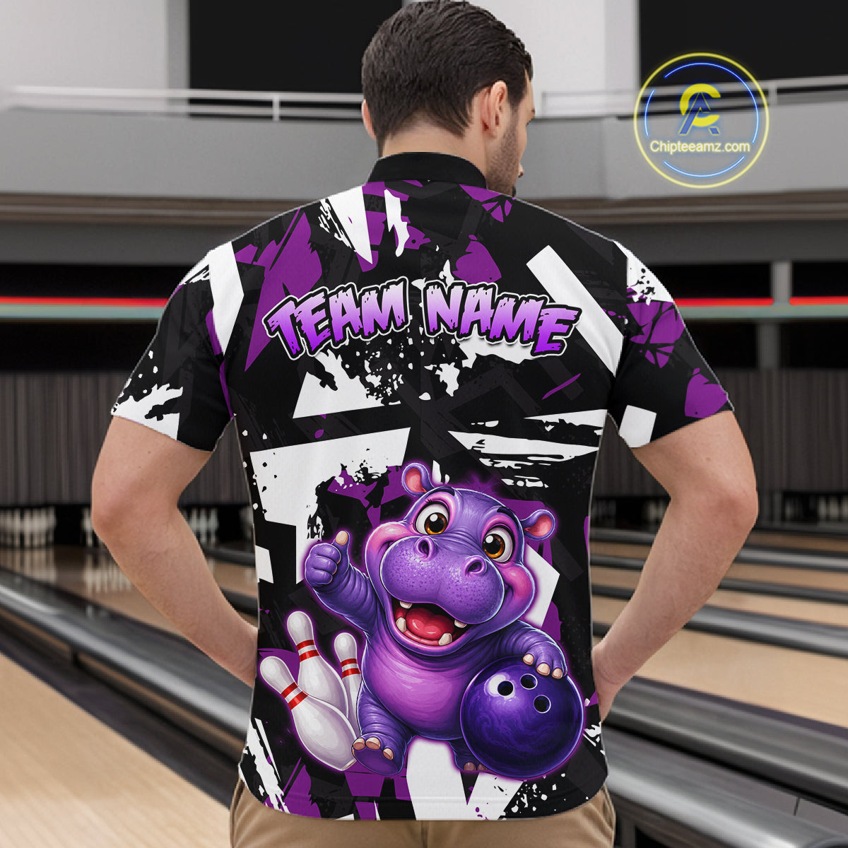Man wearing a bowling quarter zip shirt featuring a cheerful purple hippo mascot holding a bowling ball, with custom team name text.