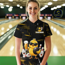 Load image into Gallery viewer, Women wearing bowling quarter zip shirt featuring a chick holding a bowling ball surrounded by smiling pins and beer graphics on black yellow background.