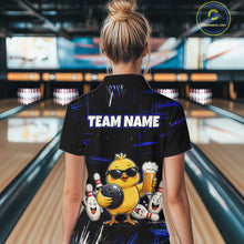 Load image into Gallery viewer, Women wearing bowling polo shirt featuring a chick holding a bowling ball surrounded by smiling pins and beer graphics on black yellow background