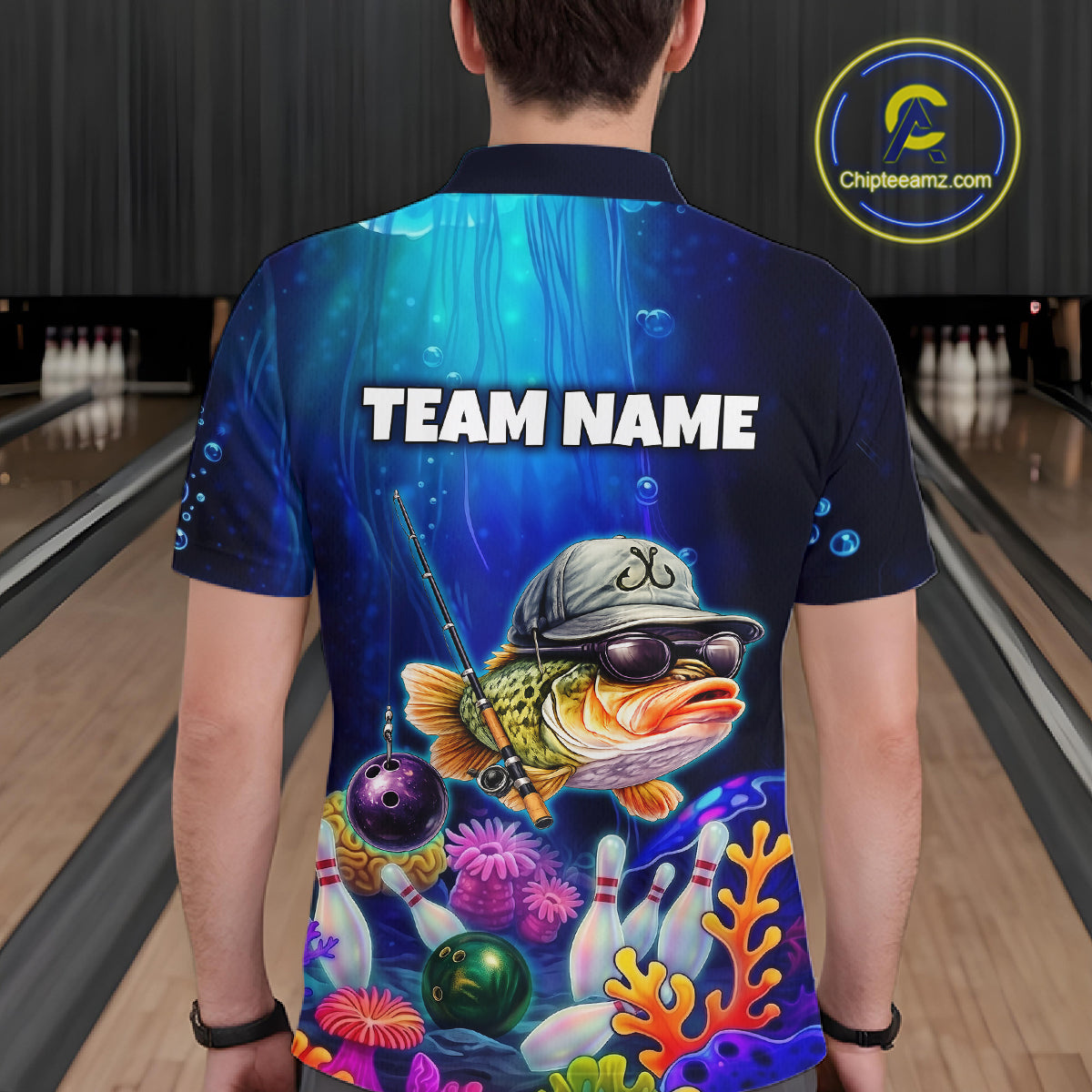 Man wearing an underwater-themed bowling polo featuring a fish mascot wearing sunglasses and a cap, colorful coral reefs, bowling pins, bowling balls, and custom your team text.