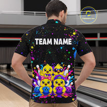 Load image into Gallery viewer, Men wearing personalized bowling quarter zip shirt with cartoon chicks holding bowling balls, framed by pins and colorful paint patterns on a black layout.