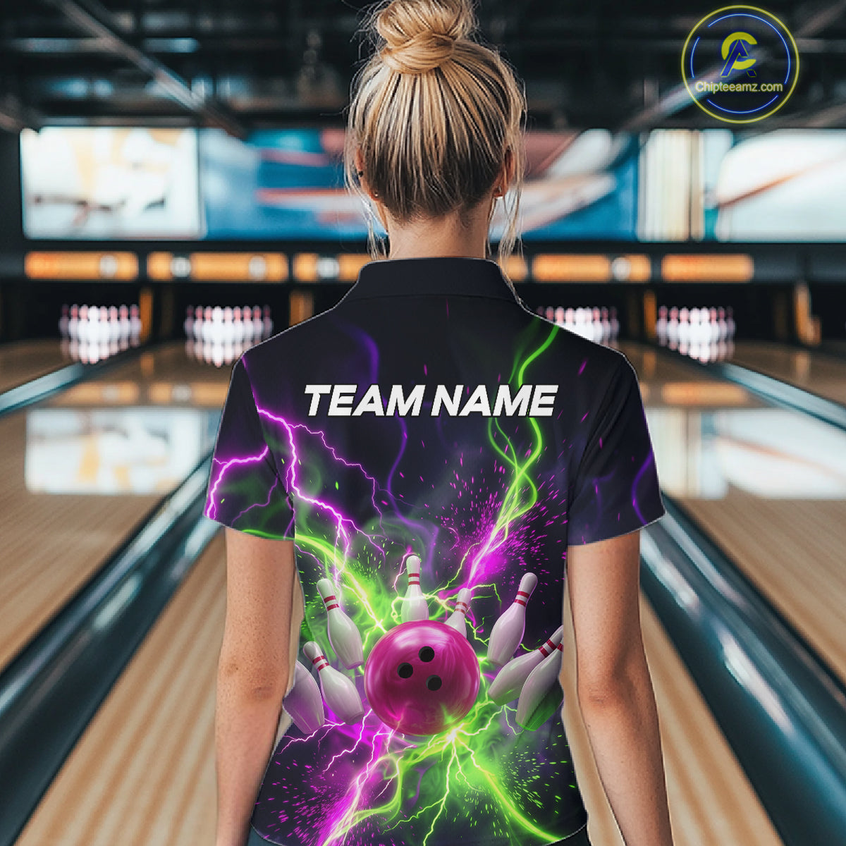 Women wearing personalized bowling polo with pink ball, scattered pins, neon lightning, team name, and player name on black background