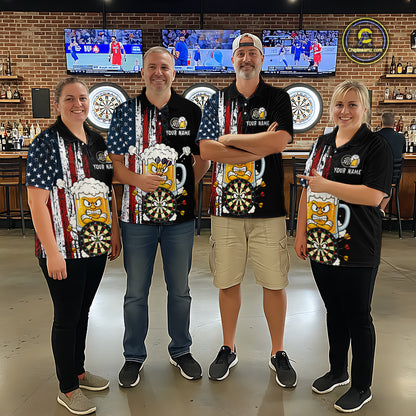 Four people wearing matching bar-themed shirts in a casual setting with dartboards and televisions in the background.