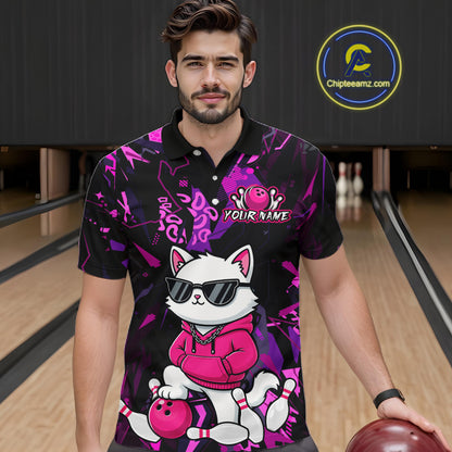 A man wearing a black and purple bowling-themed short-sleeve polo shirt with a cartoon cat graphic, standing in a bowling alley holding a bowling ball. A circular 'Chipleamz.