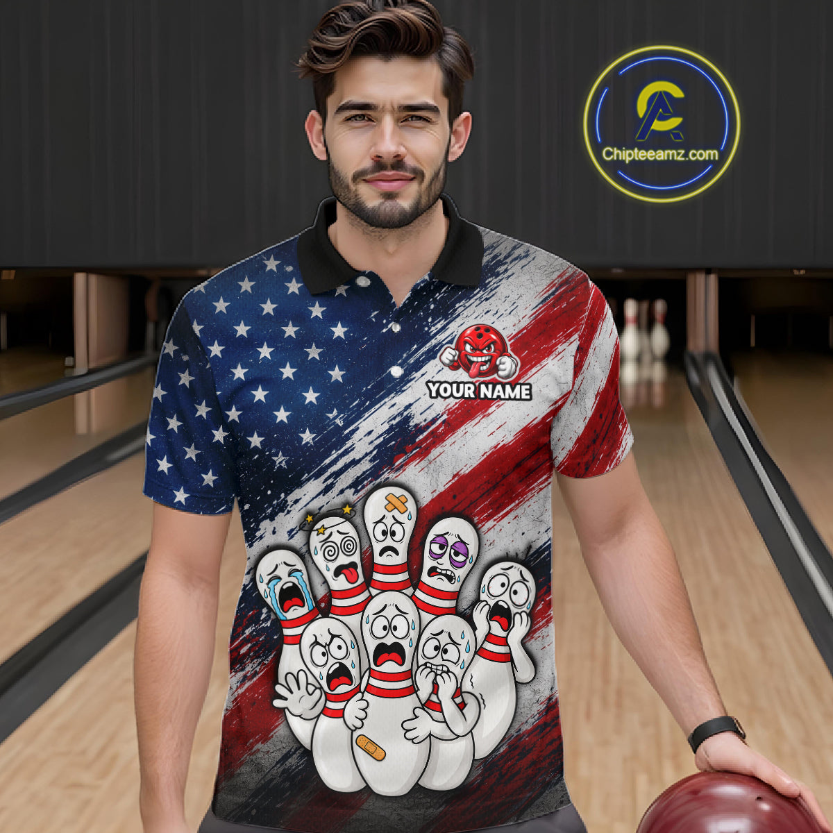 A man in a bowling alley wearing a custom short-sleeve polo shirt with a red, white, and blue American flag design and cartoon bowling pins. He is holding a bowling ball, with a 'Chipteeamz.