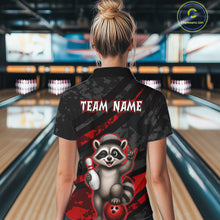 Load image into Gallery viewer, Person wearing a bowling shirt with a raccoon graphic and 'TEAM NAME' text in a bowling alley.