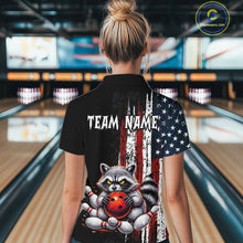 Load image into Gallery viewer, Women’s us flag raccoon bowling polo shirt, back view on female model in bowling lane 