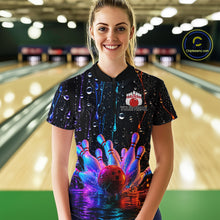 Load image into Gallery viewer, Women wearing a colorful bowling shirt with a bowling ball design in a bowling alley.
