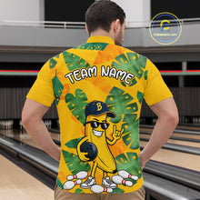 Load image into Gallery viewer, Man in a bowling alley wearing a bright yellow tropical quarter zip shirt with green leaf patterns, custom team name text, and a smiling banana mascot holding a bowling ball.