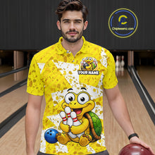 Load image into Gallery viewer, Man wearing a yellow bowling shirt with cartoon turtle design in a bowling alley.