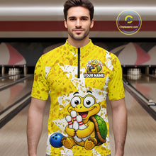Load image into Gallery viewer, Man wearing a yellow bowling jersey with cartoon turtle design in a bowling alley.