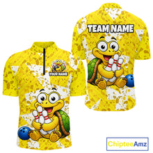 Load image into Gallery viewer, Front and back views of a bright yellow bowling quarter zip shirt with abstract splatter patterns, featuring a cheerful cartoon turtle holding bowling pins and a blue bowling ball graphic.