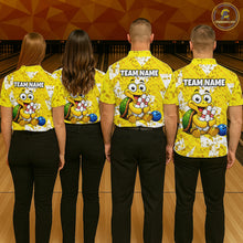 Load image into Gallery viewer, Four people wearing matching yellow bowling shirts with turtle characters and 'Team Name' text at a bowling alley.