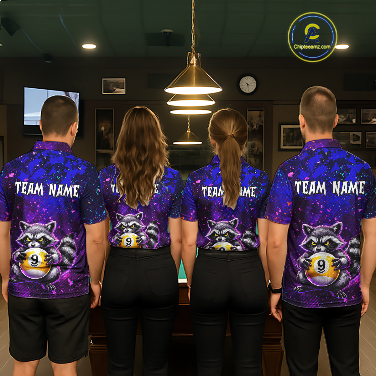 Four people wearing matching purple billiard shirts with raccoon and pool ball designs in a billiard alley.