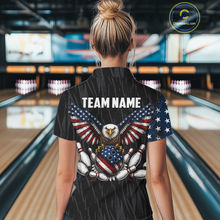Load image into Gallery viewer, Woman wearing a black patriotic bowling polo shirt featuring distressed American flag graphics, custom team name text, and a bald eagle with spread wings above a flag-themed bowling ball and pins.