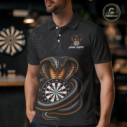 Man wearing darts polo shirt featuring a cobra wrapped around a dartboard with detailed cobra snake on a black background.