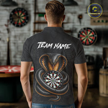 Load image into Gallery viewer, Man wearing darts polo shirt featuring a cobra wrapped around a dartboard with detailed cobra snake on a black background.