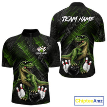 Load image into Gallery viewer, Front and back bowling quarter zip shirt featuring a dinosaur standing among bowling pins and ball artwork on black green textured background.
