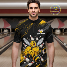Load image into Gallery viewer, Man wearing bowling quarter zip shirt featuring a muscular bee holding a bowling ball surrounded by pins on black yellow background.