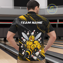 Load image into Gallery viewer, Man wearing bowling quarter zip shirt featuring a muscular bee holding a bowling ball surrounded by pins on black yellow background.