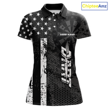 Load image into Gallery viewer, Front darts polo shirt featuring dartboard patterns layered with american flag graphics and geometric details on a black background.