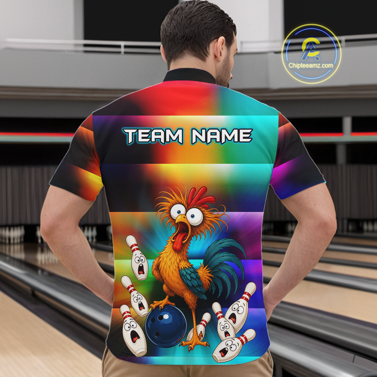 Man wearing a colorful bowling quarter zip featuring a shocked rooster chicken, blue bowling ball, surprised pins, and custom your name text.