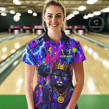 Load image into Gallery viewer, Women wearing personalized bowling polo shirt with a crowned cat holding a bowling ball, blended with colorful paint strokes and graphic patterns.