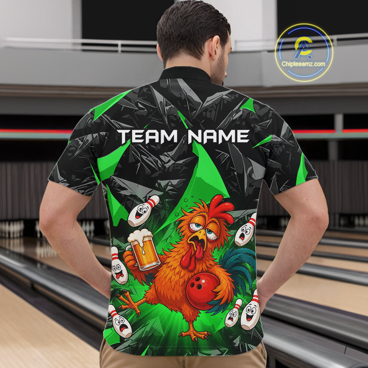 Man wearing a black and green bowling  quarter zip featuring a wild rooster mascot holding a beer mug and red bowling ball, with custom team name text.