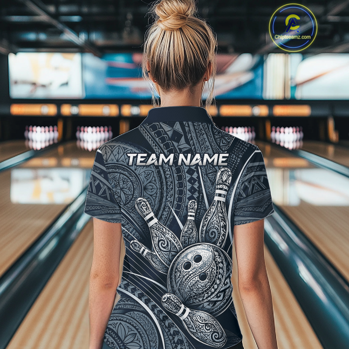 Women wearing personalized bowling quarter zip shirt with bowling balls and pins arranged within polynesian tribal patterned artwork across a navy blue layout.