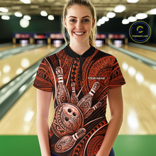 Load image into Gallery viewer, Women wearing personalized bowling quarter zip shirt with bowling balls and pins arranged within orange polynesian tribal patterned artwork across a dark layout.