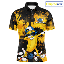 Load image into Gallery viewer, Polo shirt with a cartoon character design on a black and yellow background, featuring the brand 'ChipteeAmz'.