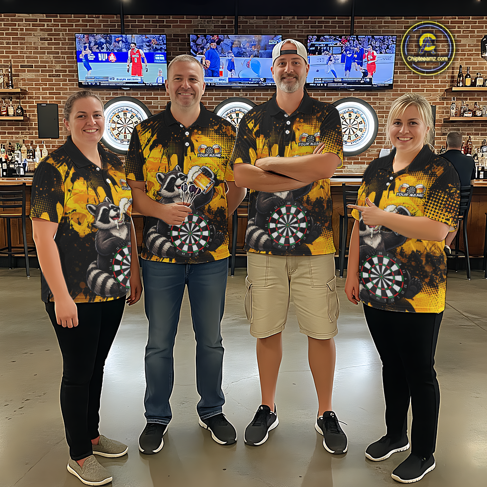 Four people wearing black and yellow darts polo featuring a raccoon drinking beer, dartboard graphics, and custom team and player name text.