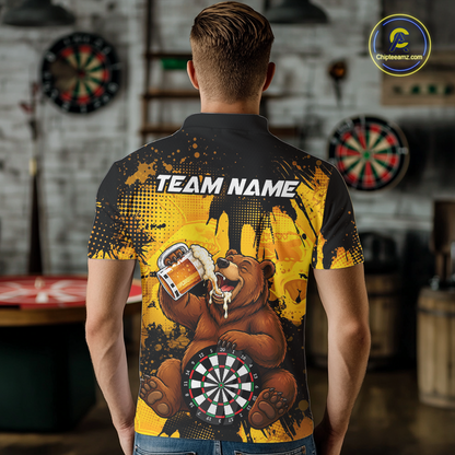 Man wearing a black and yellow darts polo featuring a bear drinking beer, dartboard graphics, and custom team and player name text.