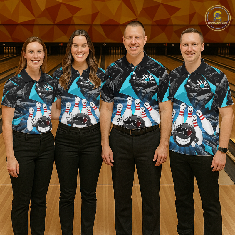 Four people standing together in a bowling alley wearing matching bowling shirts with a cartoon bowling ball character and bowling pins, paired with black pants.