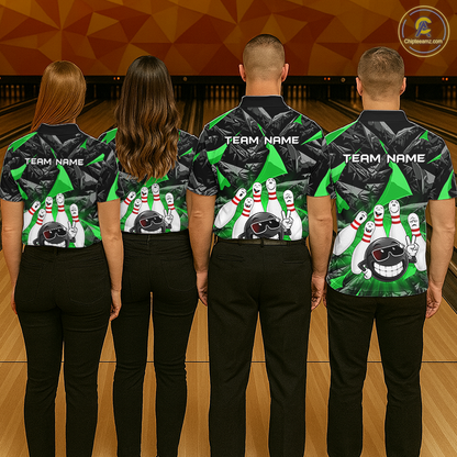 Four people standing with their backs to the camera in a bowling alley, wearing matching green and black bowling-themed jerseys with bowling pin graphics and customizable 'TEAM NAME' text on the back.