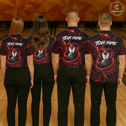 Four people standing with their backs to the camera in a bowling alley, wearing matching black short-sleeve bowling shirts with a red and black snake graphic, a bowling ball, and the text 'TEAM NAME' printed on the back.