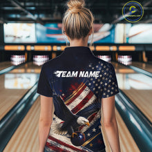 Load image into Gallery viewer, Women’s us flag eagle bowling polo shirt, back view on female model in bowling lane 