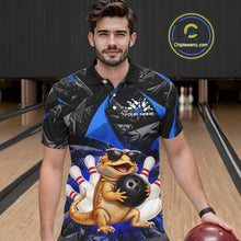 Load image into Gallery viewer, Men’s blue bearded dragon bowling polo shirt, front view on male model in bowling lane 