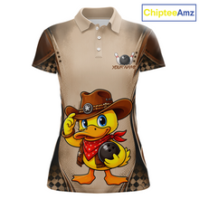 Load image into Gallery viewer, Beige polo shirt with cartoon duck wearing a cowboy hat and holding a bowling ball, branded 'ChipteeAmz'.