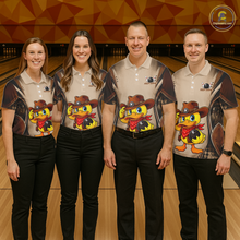 Load image into Gallery viewer, Four people wearing matching shirts with a cartoon duck design on a bowling alley.