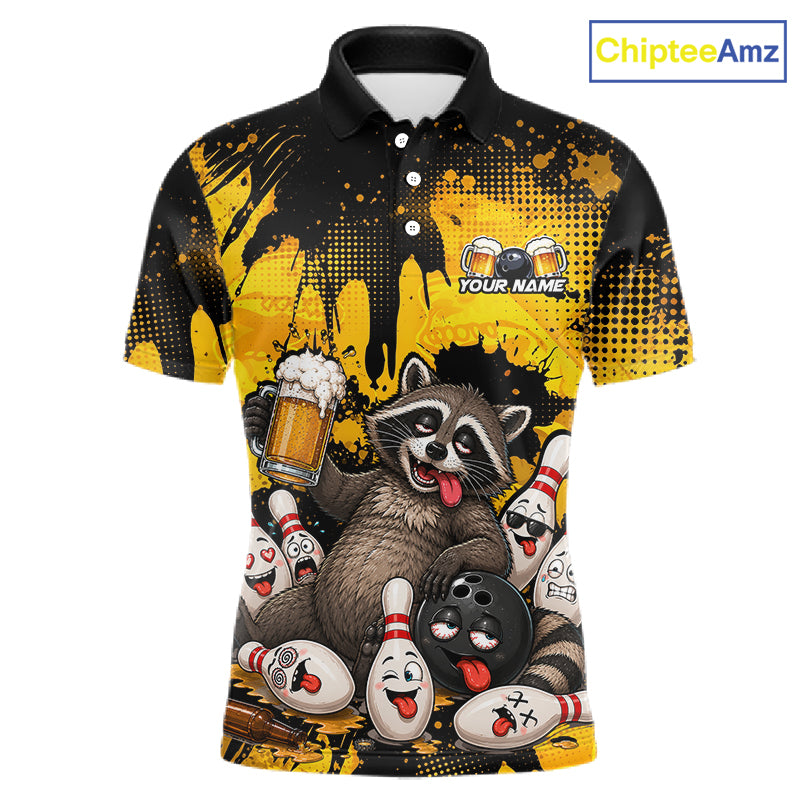 A short-sleeve polo shirt with a black collar and sleeves, featuring a bold yellow and black paint-splatter design. The front is decorated with a cartoon raccoon holding a beer mug, surrounded by bowling pins and bowling balls with funny faces.