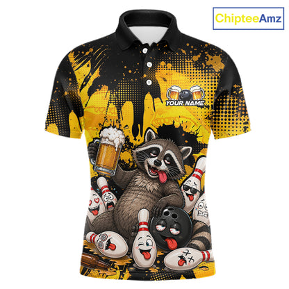 A short-sleeve polo shirt with a black collar and sleeves, featuring a bold yellow and black paint-splatter design. The front is decorated with a cartoon raccoon holding a beer mug, surrounded by bowling pins and bowling balls with funny faces.