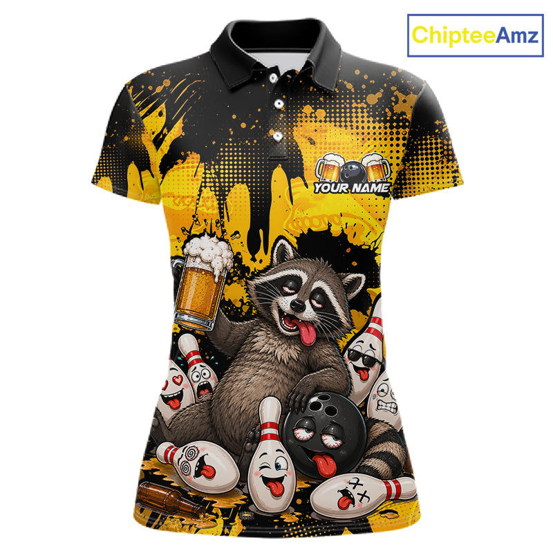 A short-sleeve polo shirt with a black and yellow splatter background and a large cartoon raccoon holding a beer mug, surrounded by bowling pins and bowling balls. The shirt has a black collar, white buttons, and a customizable name print on the left chest.