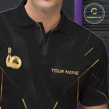 Load image into Gallery viewer, Black polo shirt with gold accents and 'Your Name' text, featuring bowling pins and ball graphics.