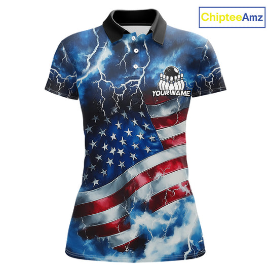 A women's short-sleeve polo shirt with a custom American flag design featuring lightning effects. The shirt has a black collar, a white button placket, and a customizable chest graphic with a bowling pin and the text 'YOUR NAME'.