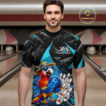 Load image into Gallery viewer, Man wearing a colorful bowling shirt with a parrot design in a bowling alley.