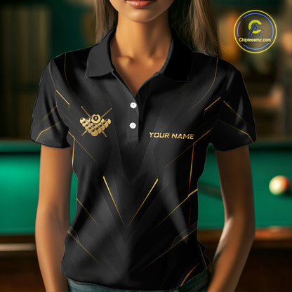 Black polo shirt with gold accents and customizable text in front of a pool table.