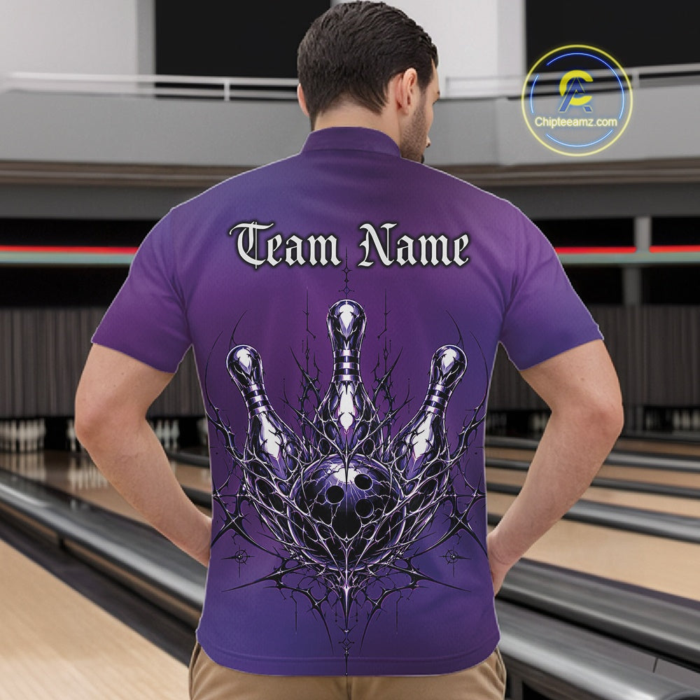Man wearing a purple bowling shirt with a design on the back in a bowling alley.